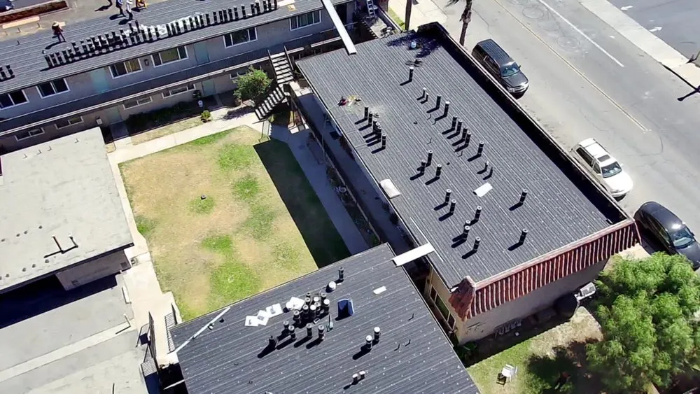 Slide of Queen Roofing