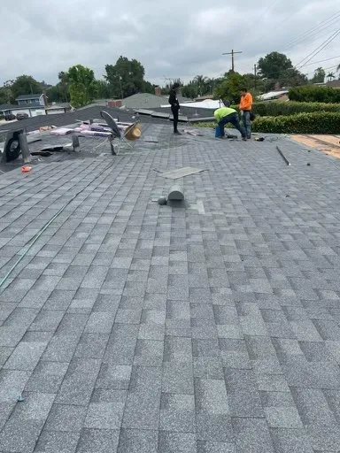 Slide of Queen Roofing