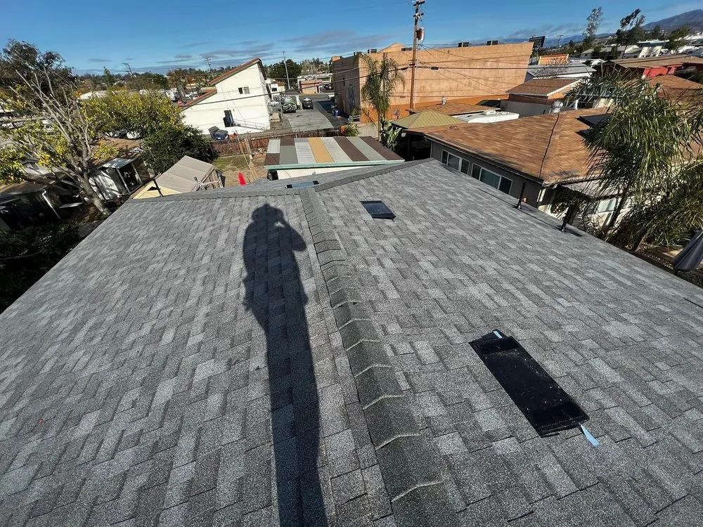 Slide of Queen Roofing