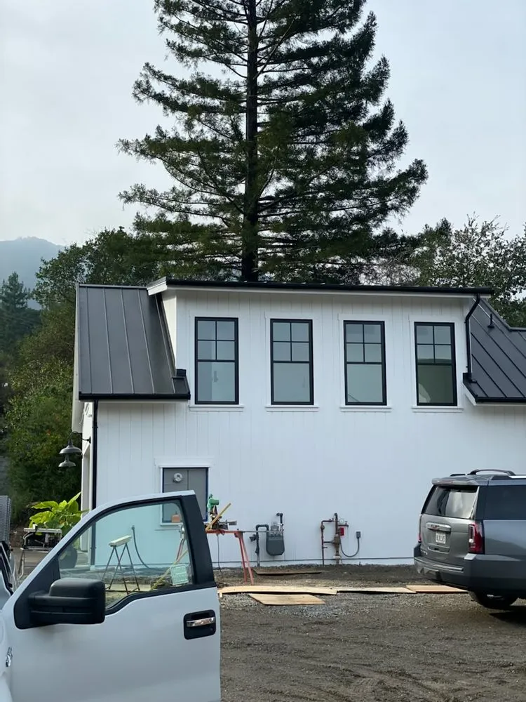 Slide of Quevedo Roofing