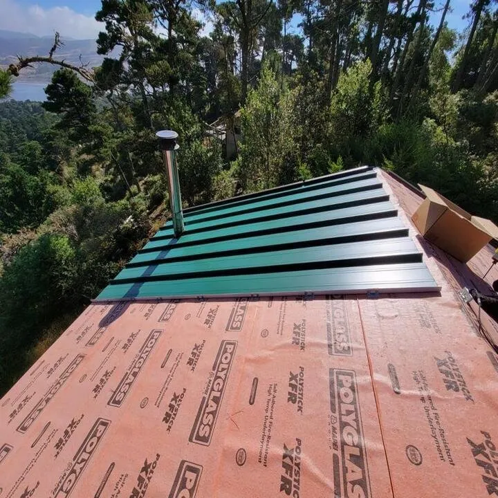 Slide of Quevedo Roofing