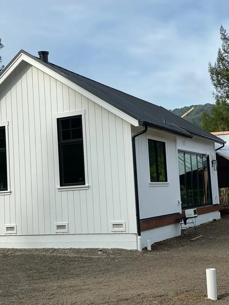 Slide of Quevedo Roofing