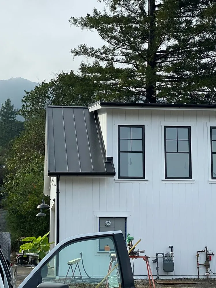 Slide of Quevedo Roofing