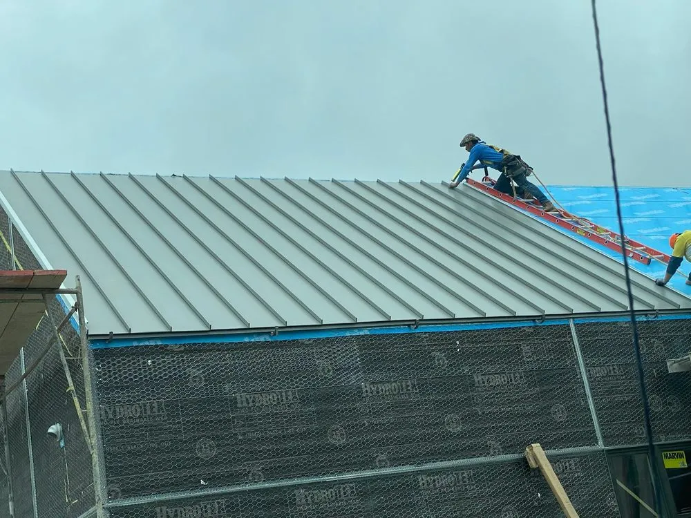 Slide of Quevedo Roofing