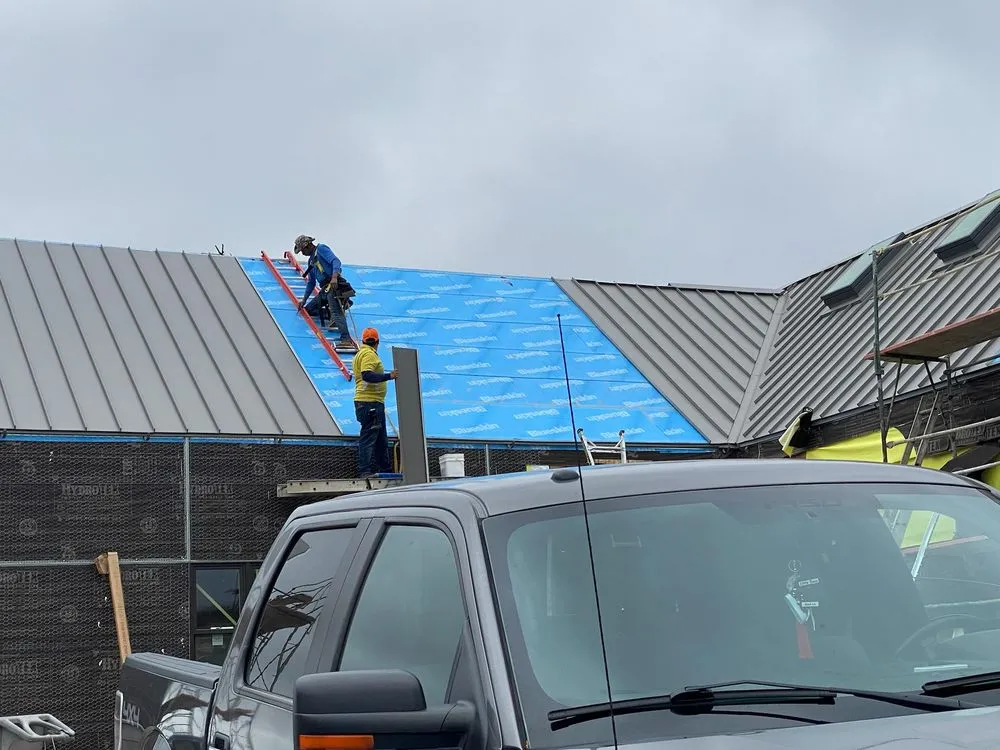 Slide of Quevedo Roofing