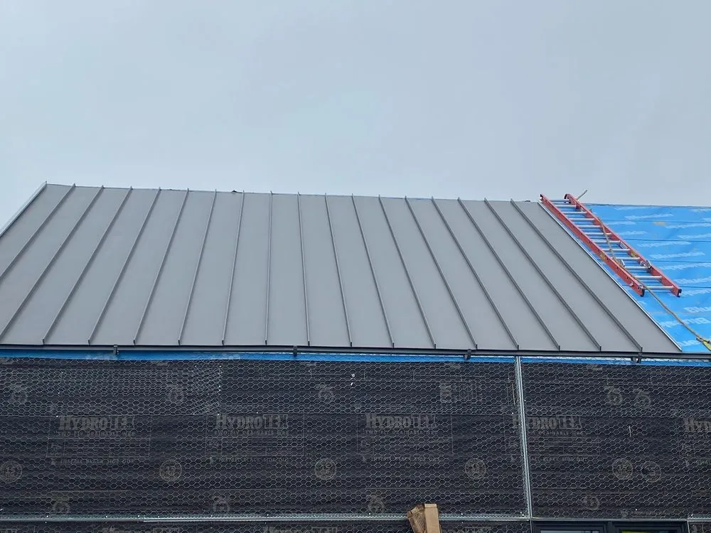 Slide of Quevedo Roofing