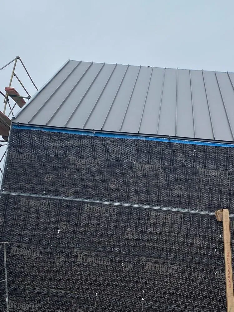 Slide of Quevedo Roofing