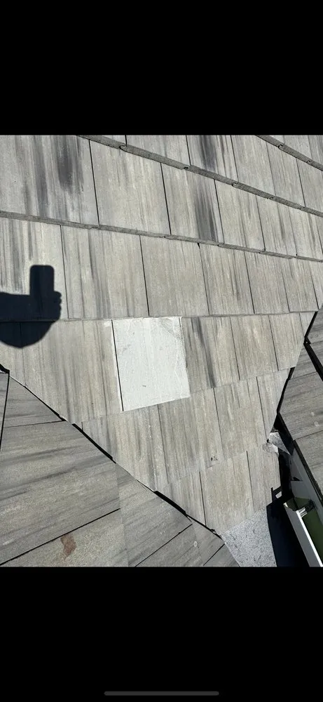 Slide of Quick Roofing