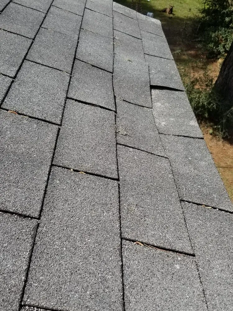 Slide of Quick Roofing