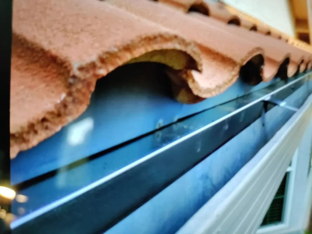 Slide of Quinn Bro's Roofing