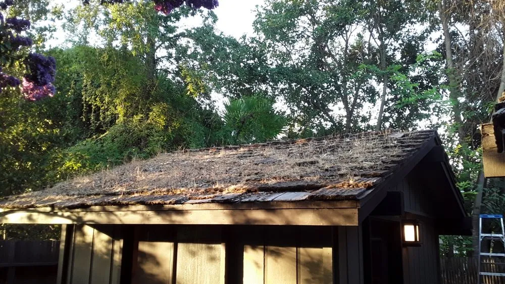 Slide of Quinn Bro's Roofing