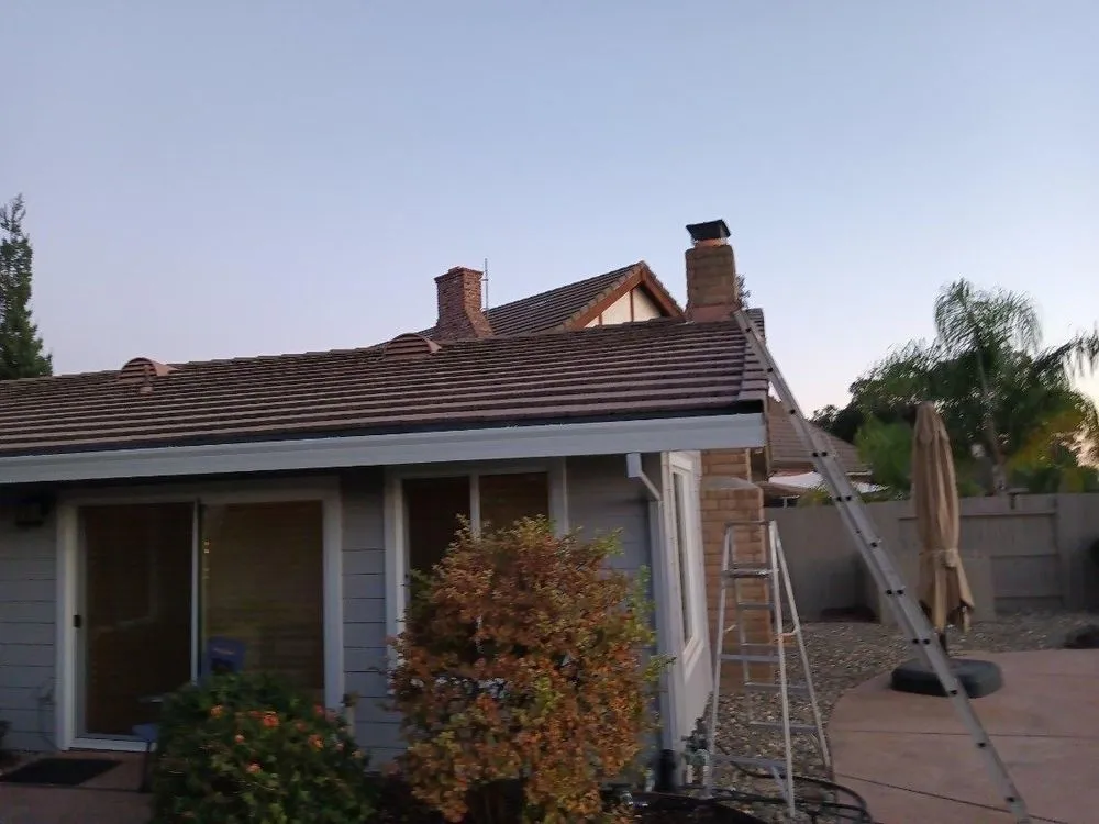 Slide of Quinn Bro's Roofing