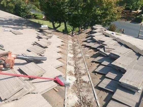 Slide of Quinn Bro's Roofing