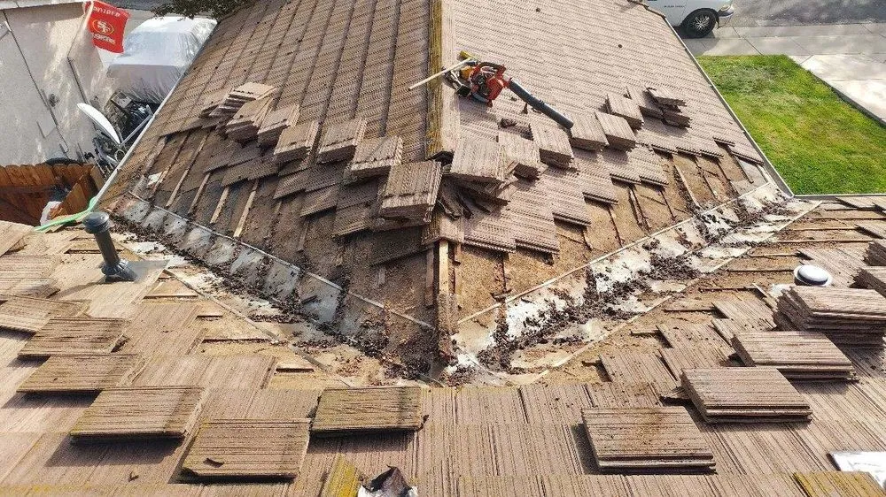 Slide of Quinn Bro's Roofing