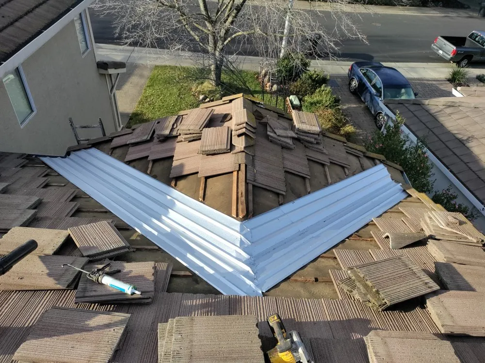 Slide of Quinn Bro's Roofing