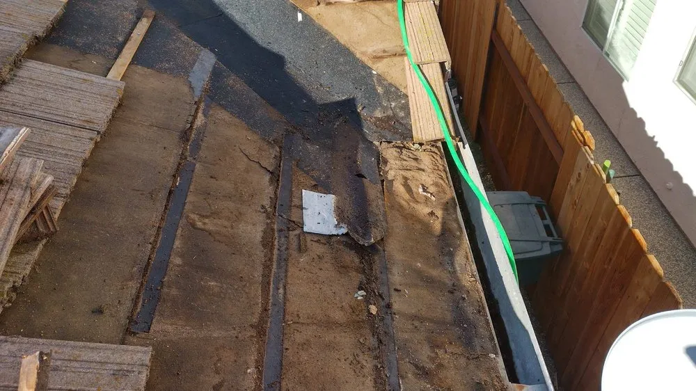 Slide of Quinn Bro's Roofing