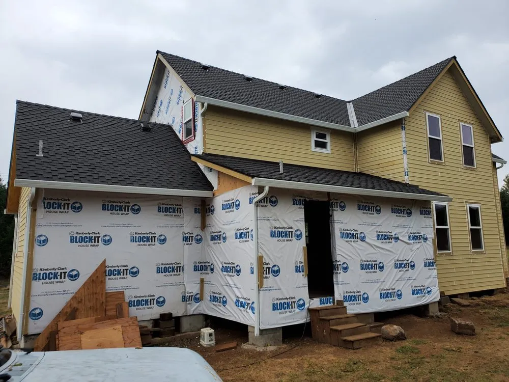 Slide of Quintana Roofing