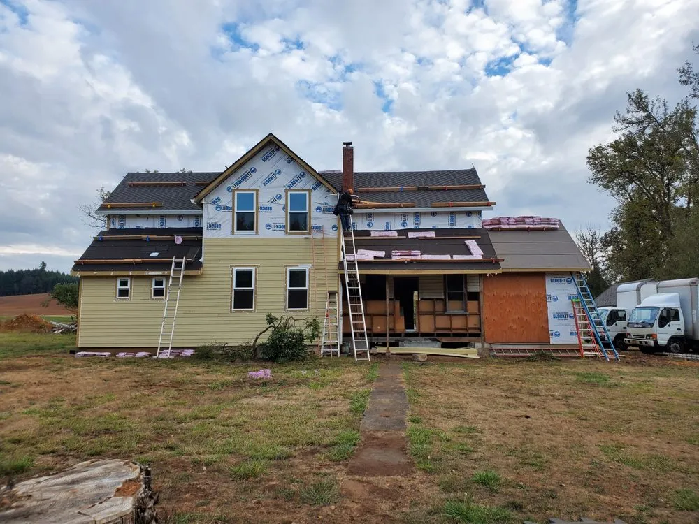 Slide of Quintana Roofing