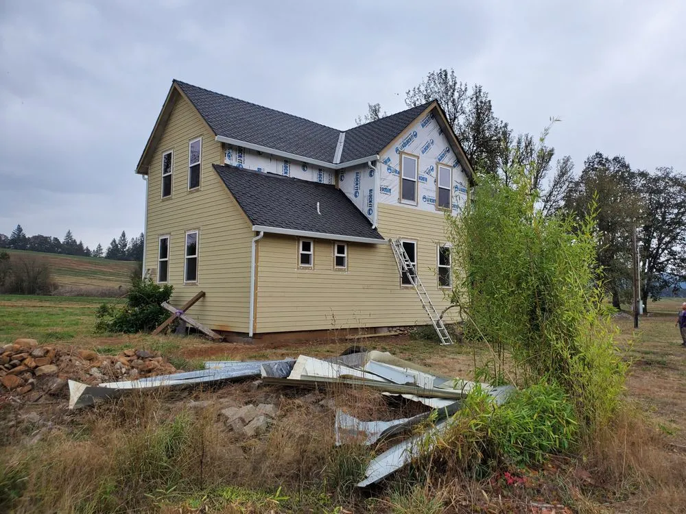 Slide of Quintana Roofing