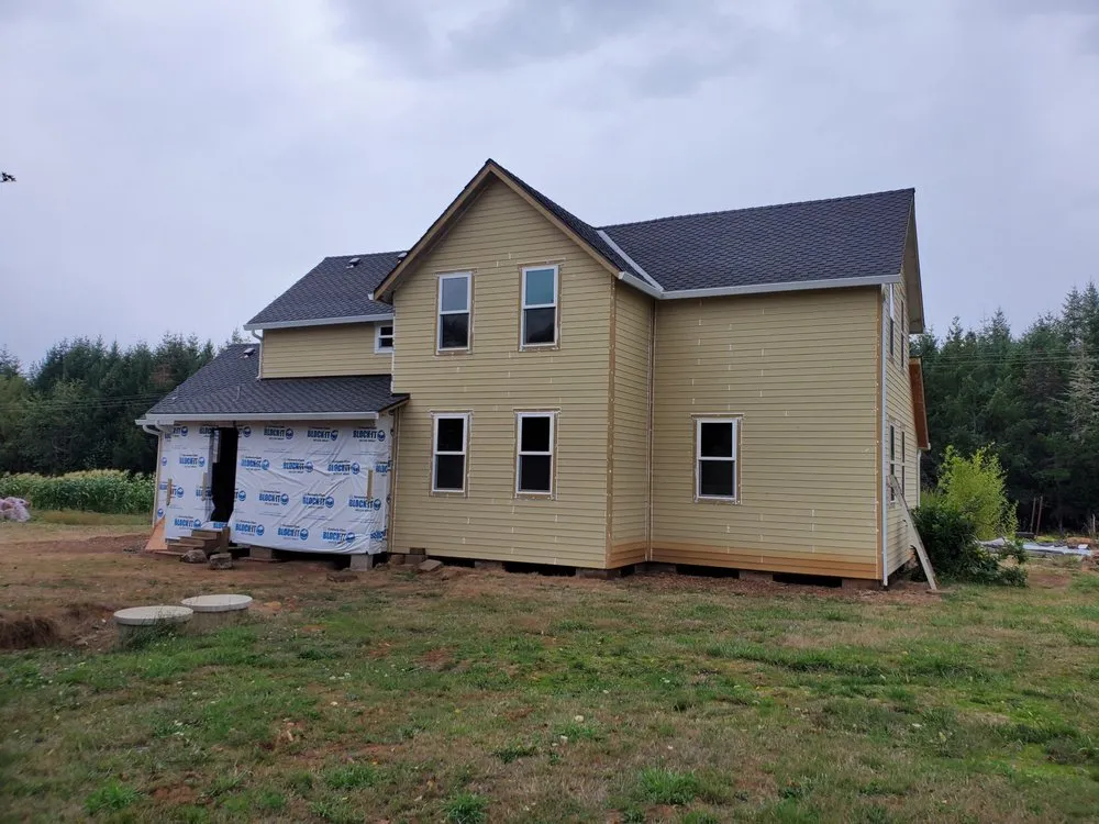 Slide of Quintana Roofing