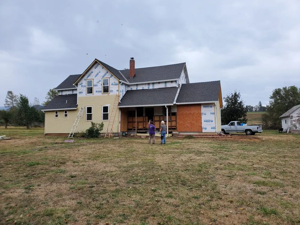 Slide of Quintana Roofing