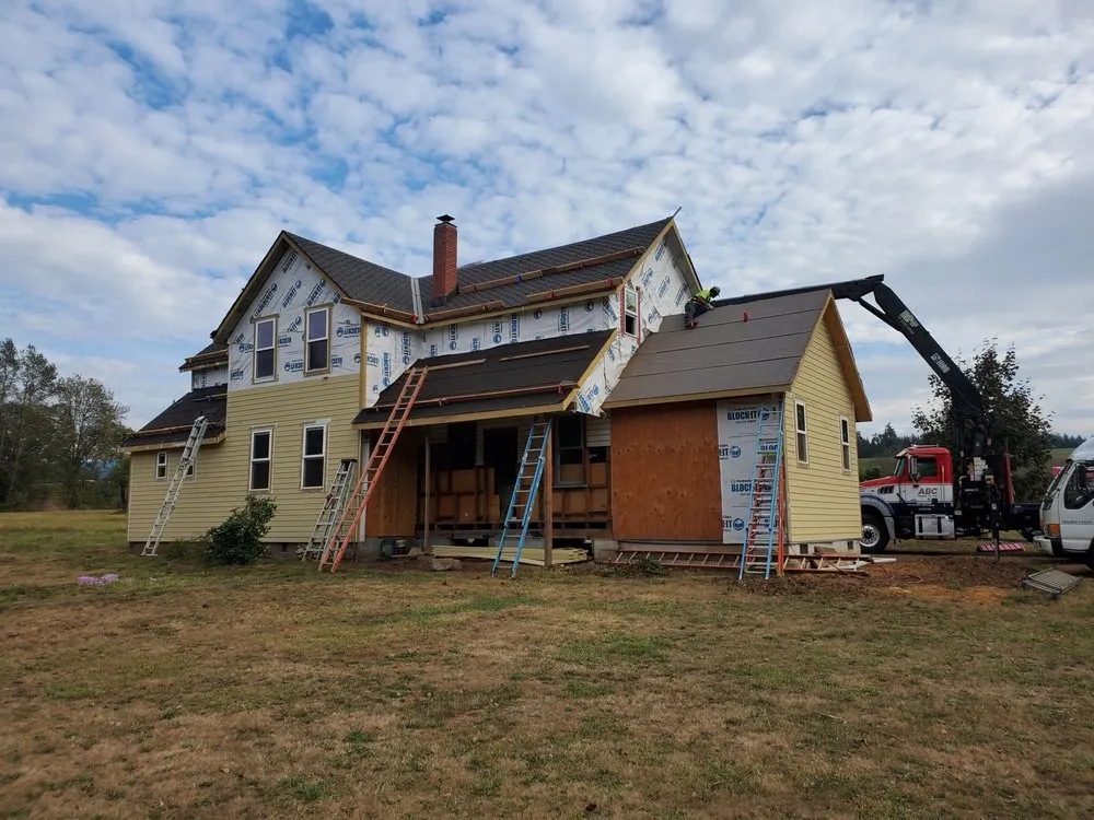 Slide of Quintana Roofing