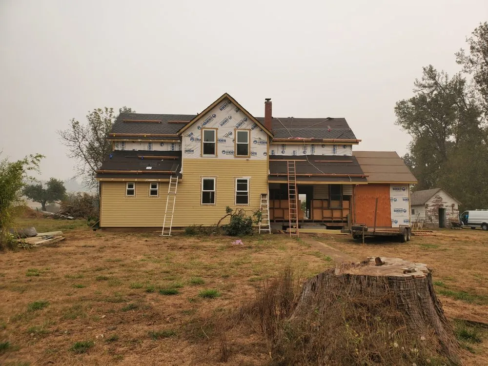 Slide of Quintana Roofing