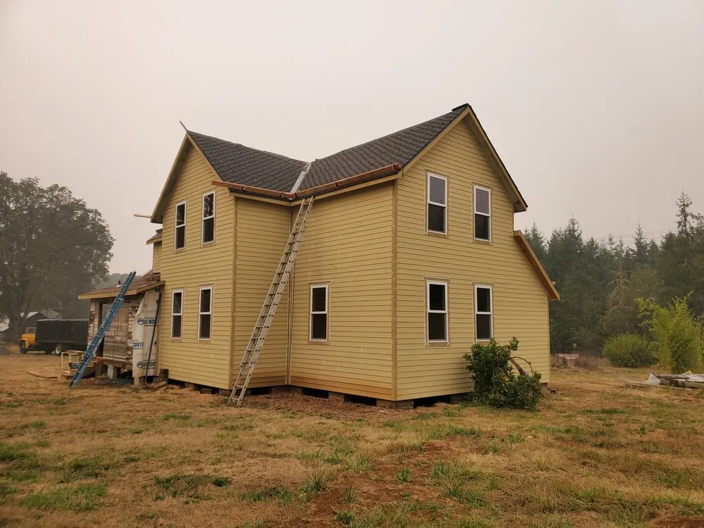 Slide of Quintana Roofing