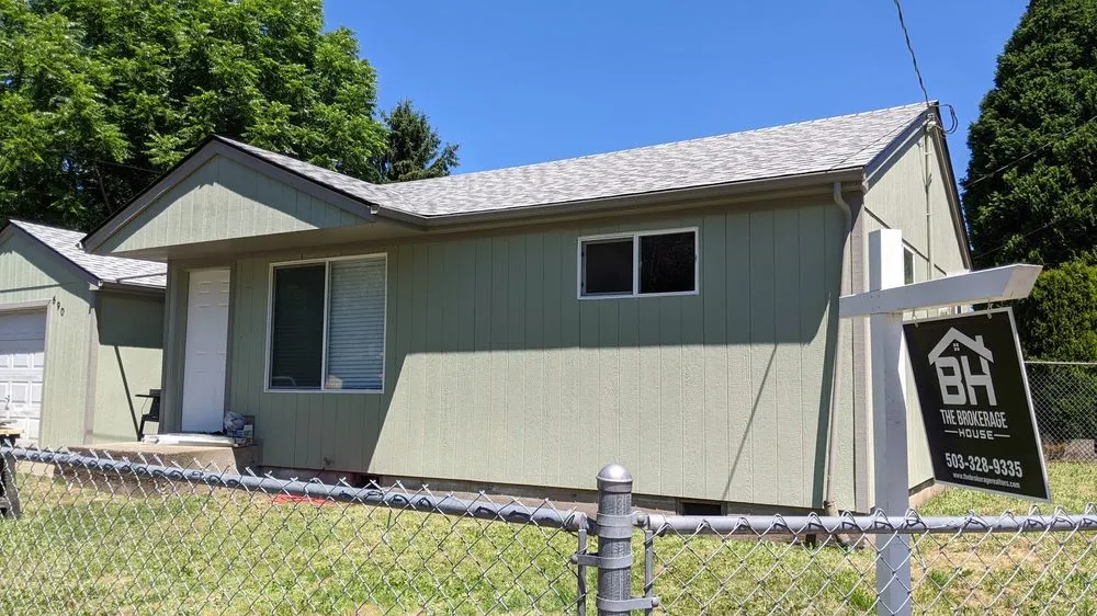 Slide of Quintana Roofing