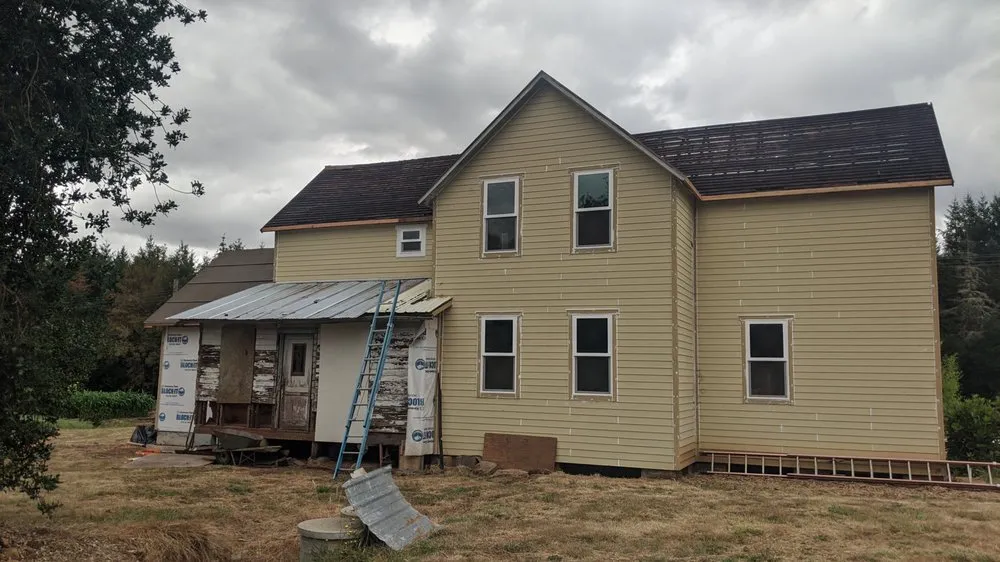 Slide of Quintana Roofing