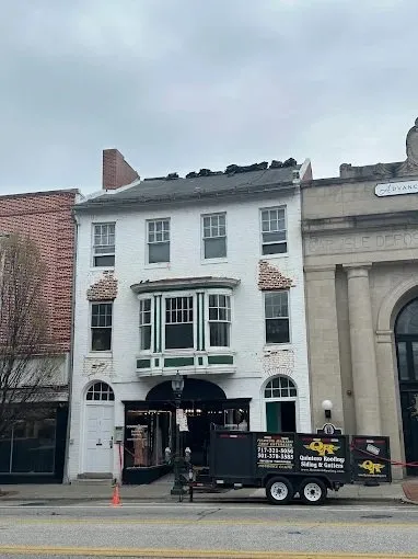 Slide of Quintero Roofing