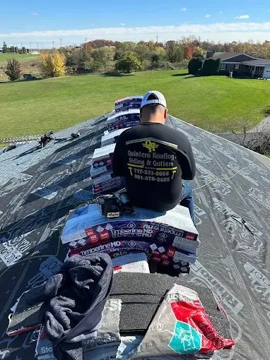 Slide of Quintero Roofing