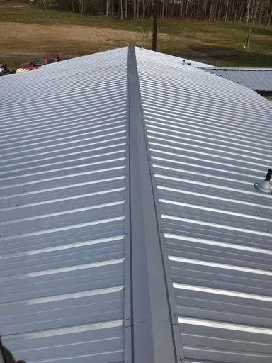Slide of Quiroz Metal Roofing