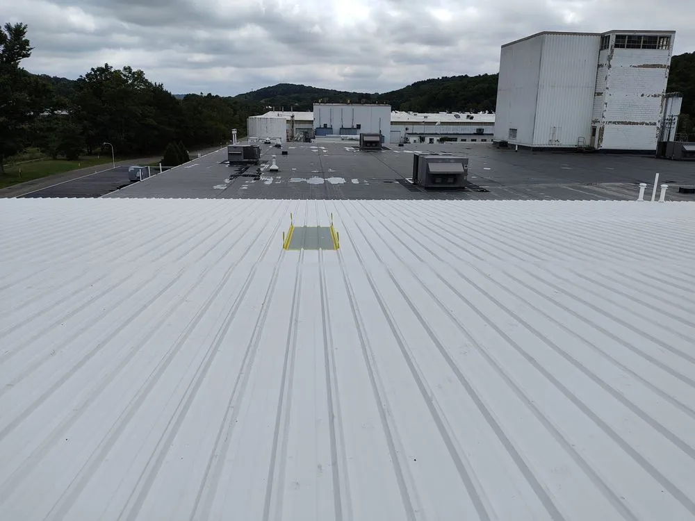 Slide of R & J Seamless Roofing Systems