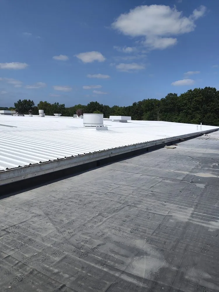Slide of R & J Seamless Roofing Systems
