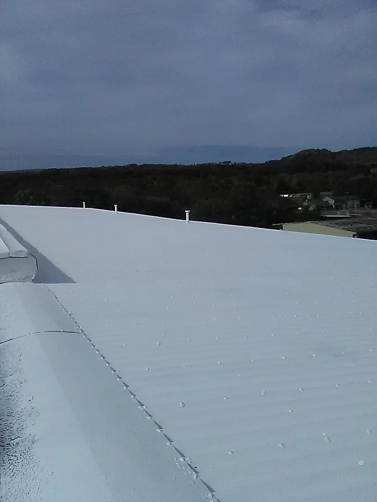 Slide of R & J Seamless Roofing Systems