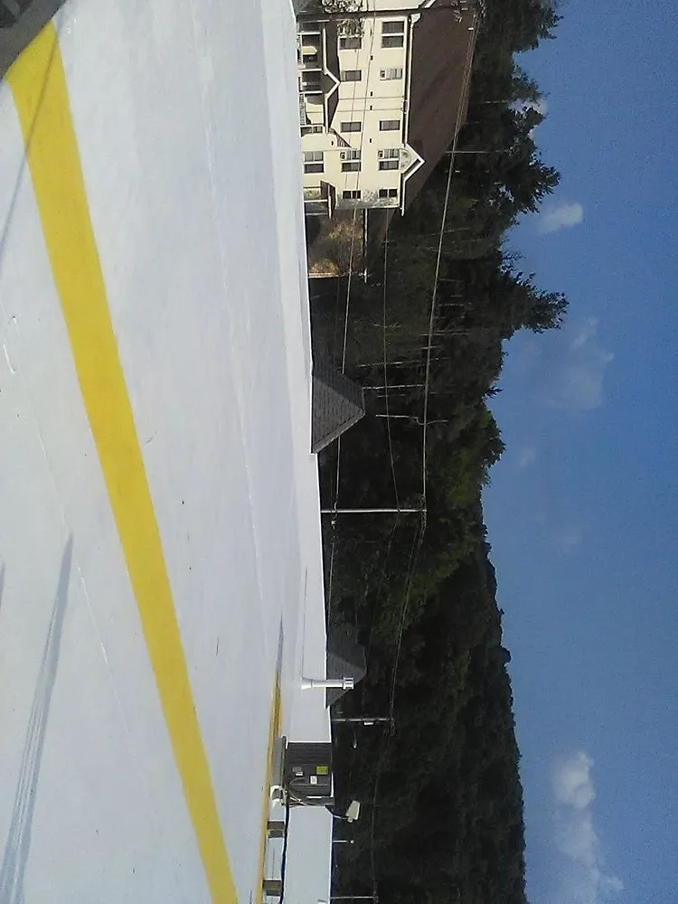 Slide of R & J Seamless Roofing Systems