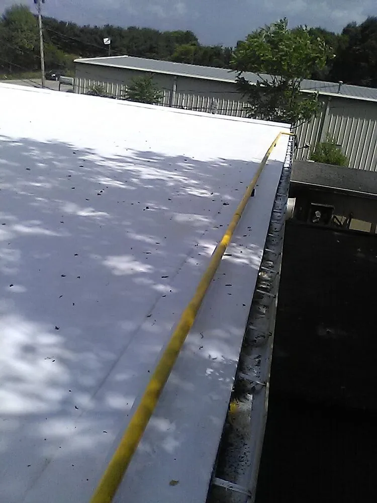 Slide of R & J Seamless Roofing Systems