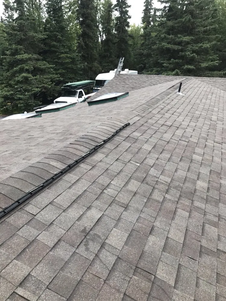 Slide of R & M Roofing