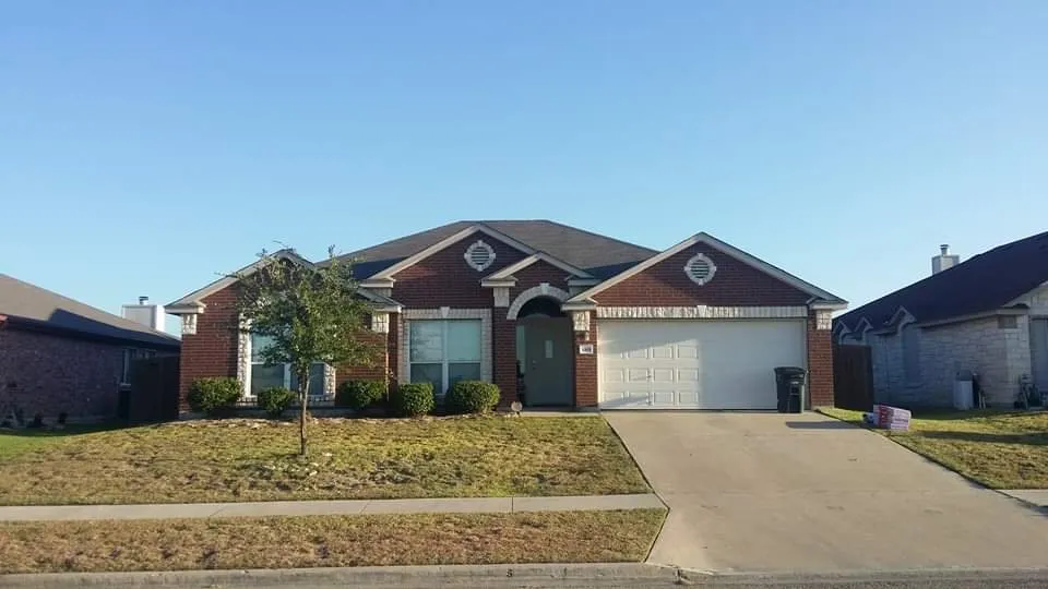 Slide of R & R Roofing