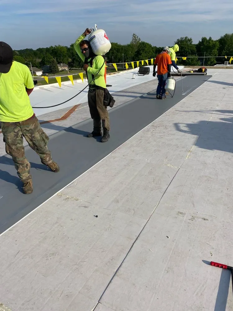 Slide of R Adams Roofing