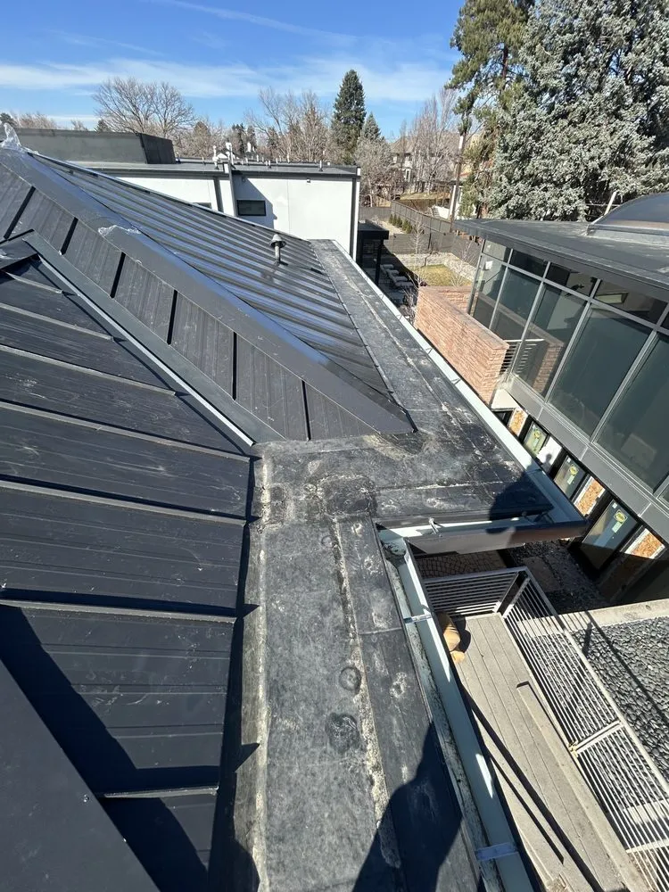 Slide of R and M Roofing