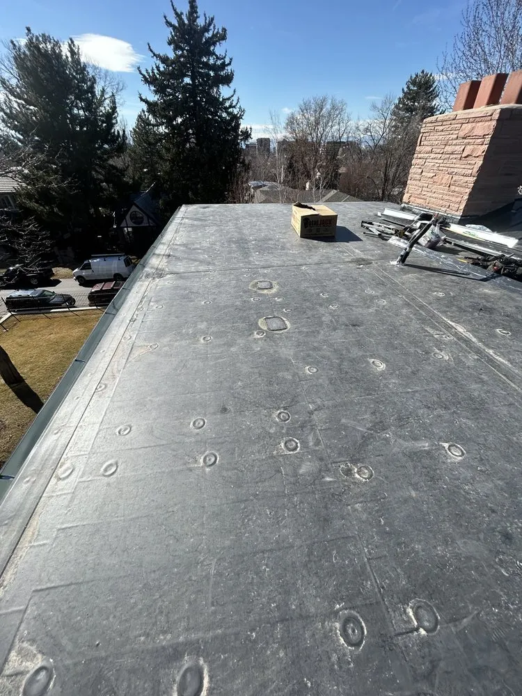 Slide of R and M Roofing