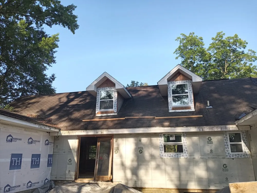 Slide of R and R Roofing Services