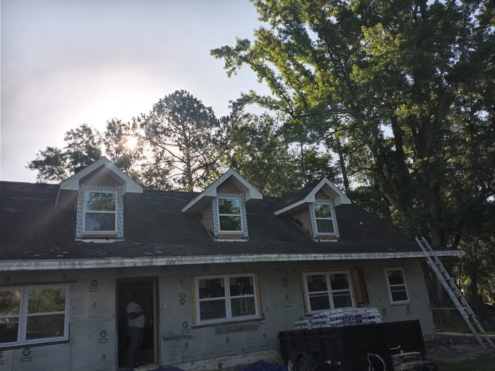 Slide of R and R Roofing Services