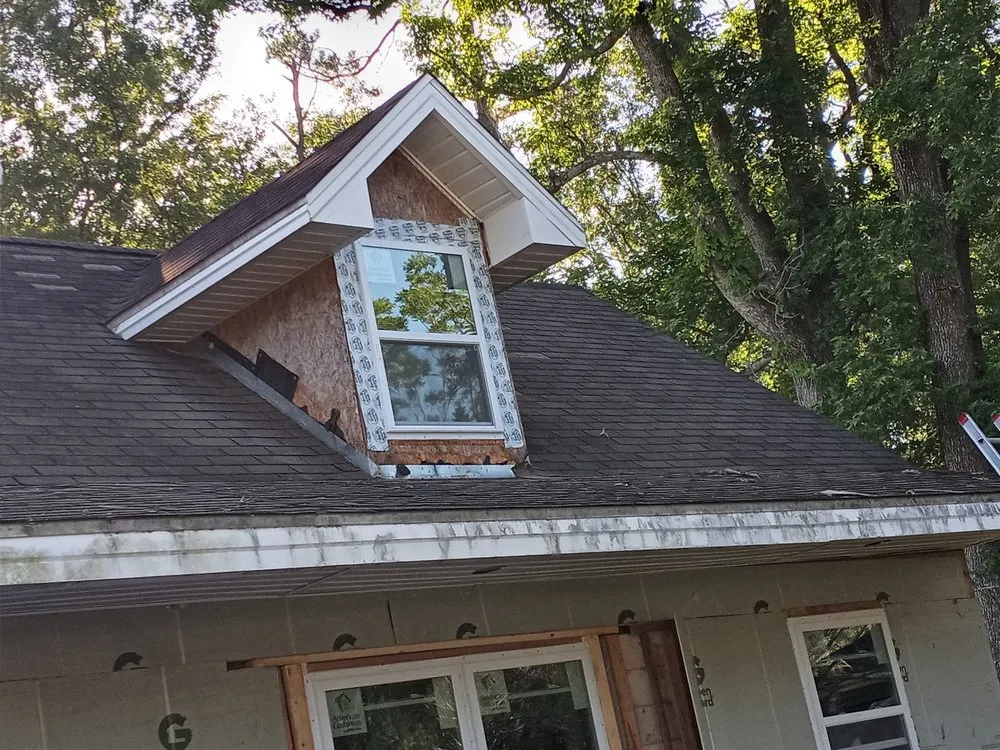 Slide of R and R Roofing Services