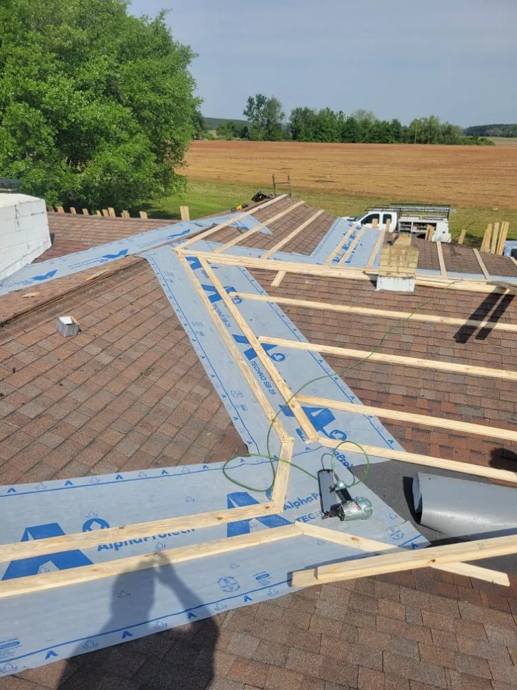 Slide of R and T Roofing and Remodeling