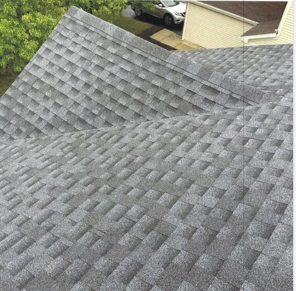 Slide of R E Duchene Roofing and Siding