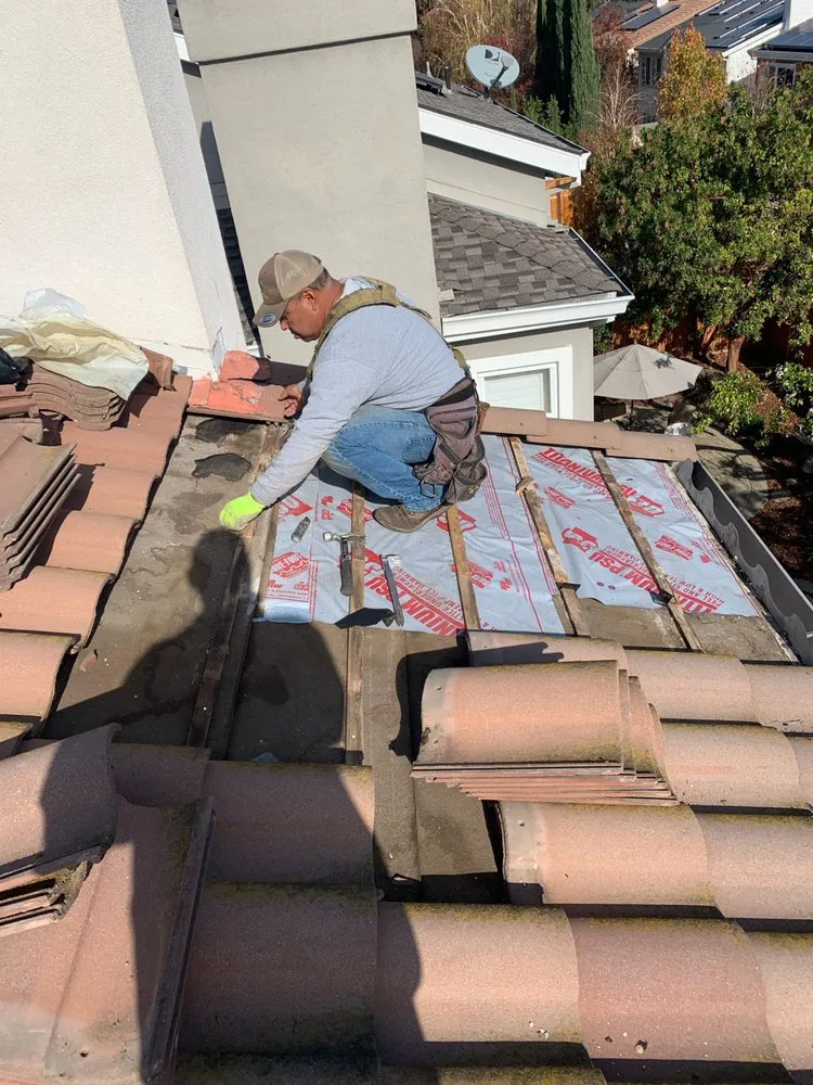 Slide of R E Roofing & Construction