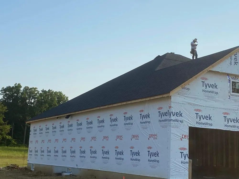 Slide of R N Roofing